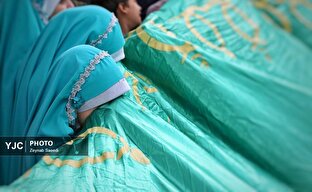 اهتزاز پرچم رضوی در همدان