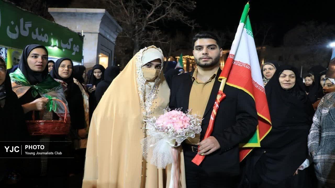 عروس و داماد ازنایی در خط مقدم مبارزه با شیاطین آمریکایی صهیونی + فیلم