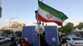 پرچمی که تاریخ را لمس کرد؛ لحظه‌ای از ایستادگی ملت