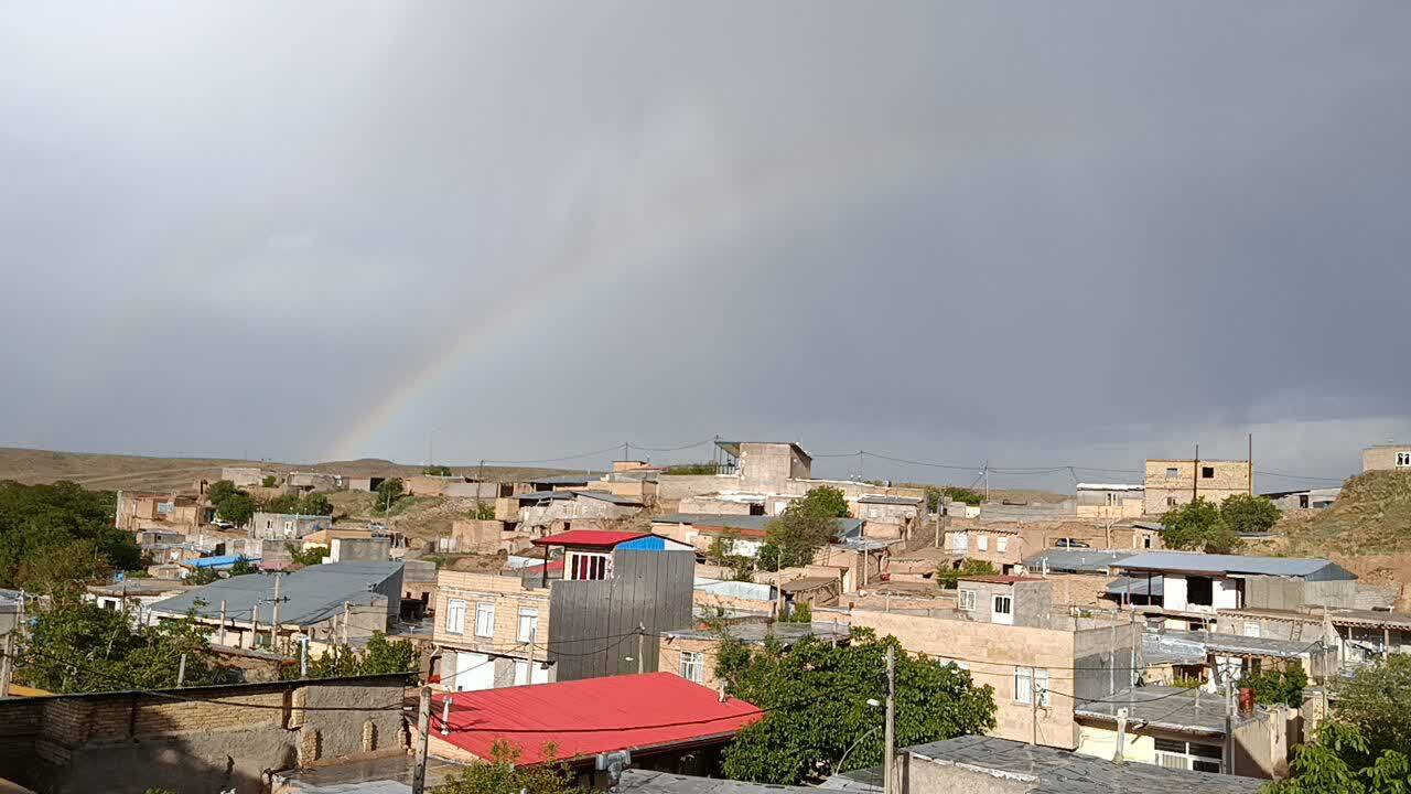 جلوه گری رنگین کمان در آسمان روستای گردشگری توآباد