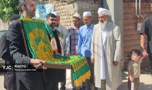 دیدار خادمان حرم مطهر رضوی با خانواده شهید امیرحسین دوگونچی در آق قلا