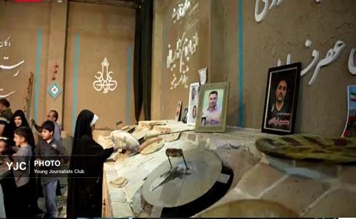 پخت نان برای رزمندگان میدان نبرد با دستان خانواده شهدا در قم