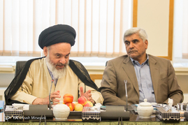 محمد فرهادی وزیر علوم، تحقیقات و فناوری و سید هاشم حسینی بوشهری رییس حوزه علمیه قم