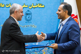 هادی اخلاقی فیض آثار مدیر عامل بانک ملت و سعید اوحدی رییس سازمان حج و زیارت