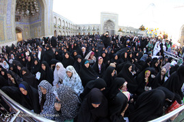 مراسم تعویض پرچم گنبد منور رضوی
