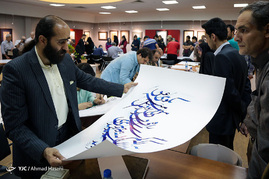 کتابت آیات قرآن کریم به مناسبت میلاد امام حسن مجتبی(ع) - مشهد‎