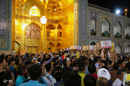 طواف پیکرهای 19 شهید گمنام دفاع مقدس در حرم مطهر امام رضا (ع)‎