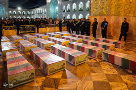 طواف پیکرهای 19 شهید گمنام دفاع مقدس در حرم مطهر امام رضا (ع)‎