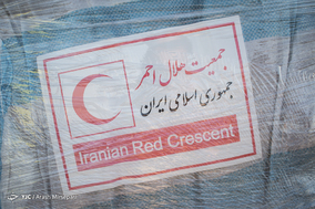 بارگیری هواپیمای حامل کمک های بشر دوستانه از سوی هلال احمر ایران به میانمار