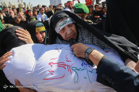 مراسم تشییع و خاکسپاری دو شهید گمنام در دانشگاه پیام نور قم