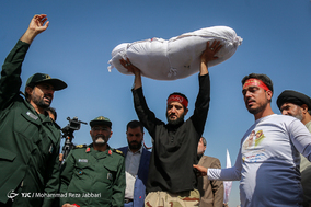مراسم تشییع و خاکسپاری دو شهید گمنام در دانشگاه پیام نور قم