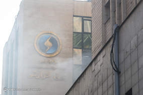 حضور شهردار تهران در محل آتش سوزی ساختمان اداری خیابان ولیعصر