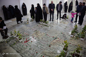 غبارروبي گلزار مطهر شهداي مدفون در حرم مطهر امام رضا (ع)