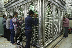 آيين تعويض پرچم گنبد حرم حضرت عبدالعظيم الحسنی (ع)
