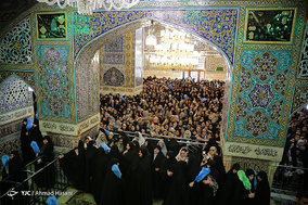 مراسم تعویض پرچم گنبد و پوشش ضریح حرم مطهر رضوی