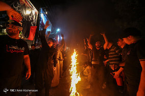آیین مشعل گردانی در دولت آباد تهران