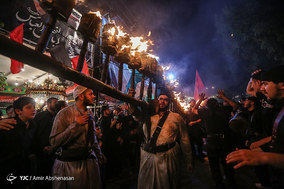 آیین مشعل گردانی در دولت آباد تهران