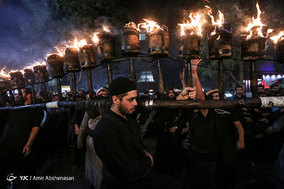 آیین مشعل گردانی در دولت آباد تهران
