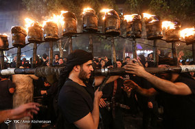 آیین مشعل گردانی در دولت آباد تهران