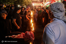 آیین مشعل گردانی در دولت آباد تهران