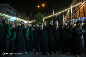 آیین مشعل گردانی در دولت آباد تهران