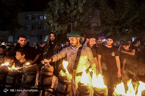 آیین مشعل گردانی در دولت آباد تهران