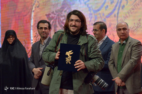 علی حدادی عکاس خبرگزاری آنا برگزیده هیئت داوران انجمن صنفی عکاسان مطبوعاتی ایران تجلی اراده ملی جشنواره فیلم فجر