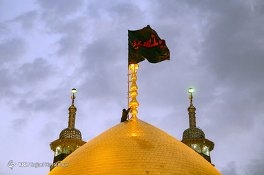 تعویض پرچم حرم حضرت معصومه(س)