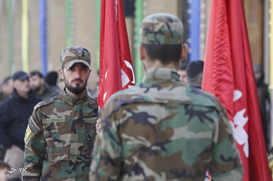 گل آرایی و تعویض پرچم حرم حضرت زینب(س)