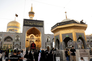 مراسم اذن عزای حسینی و تعویض پرچم گنبد حرم امام رضا (ع)