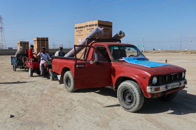 توزیع لوازم خانگی میان مددجویان کمیته امداد مناطق سیل زده استان سیستان و بلوچستان - شهرستان کنارک