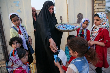 برگزاری آیین سنتی گرگیعان به مناسبت نیمه رمضان در روستای علوه از توابع اهواز - خوزستان