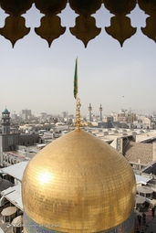 مراسم تعویض پرچم گنبد حرم مطهر رضوی