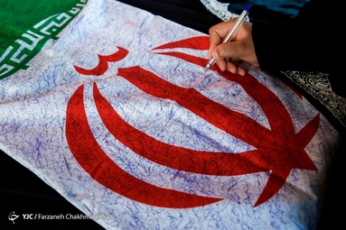 کارگاه عملی «قرمز پررنگ» با هدف نقاشی یادمان شهدای شاهچراغ در شیراز