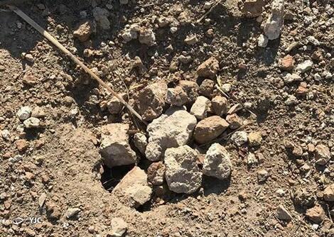 حفاری های درون عرصه آتشکده آذرجو که با سنگ پر شده 